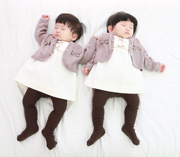 Dressing exactly the same is only acceptable for adorable twin babies 